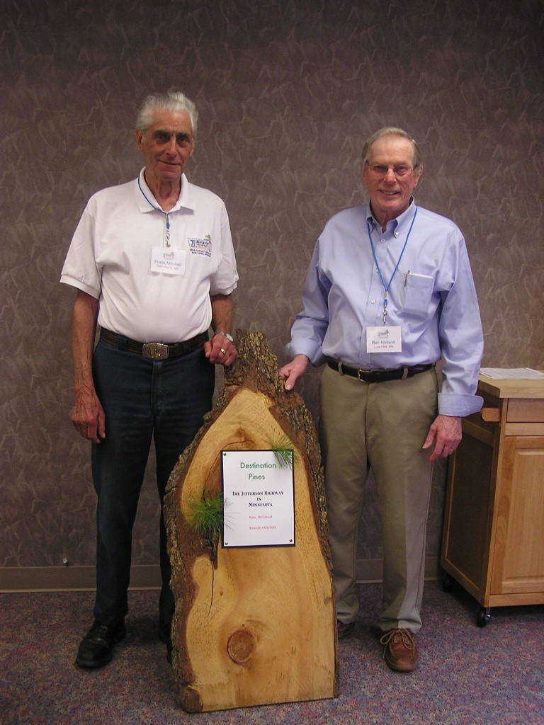 A slab from a white pine cut in 1975. Frank Mitchell and I have used it to advertise Jefferson Highway presentations. The grove that contained this tree would have been visible to the sociability caravan of 1916 as it exited Little Falls, MN (click to enlarge)